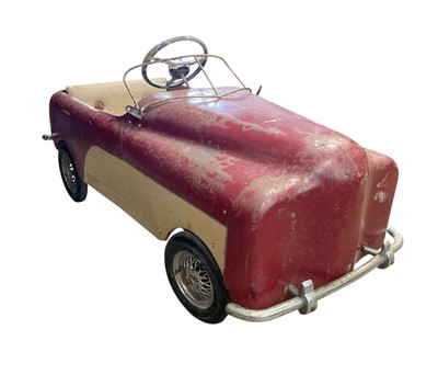 Lot 85 - Vintage Tri-ang Ford pedal car in original condition, 105cm in overall length.