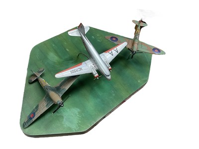 Lot 80 - Diecast model display of three Second World War Aircraft- Spitfire, Hurricane and Douglas Dakota.