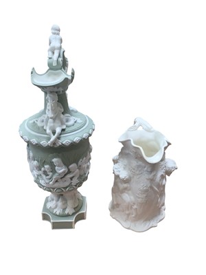 Lot 5026 - Two relief moulded jugs including one Silenus