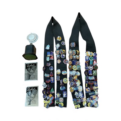 Lot 2936 - Collection of approximately 100 Butlins enamel badges dating mostly from the 1950s and 1960s, together with a Butlins Clacton 1958 trophy and two Butlins mirrors