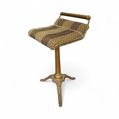 Lot 5294 - Victorian gold painted cast iron music stool, the tripod feet with foliate pattern, the adjustable fabric covered seat with brass back, 'Patent' mark to bottom