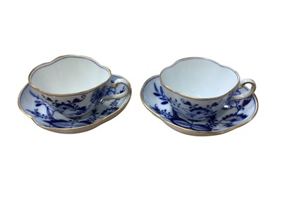 Lot 5032 - Pair of late 19th century Meissen porcelain cups and saucers with hand painted blue 'Onion' pattern decoration, purchased from Elizabeth Cannon