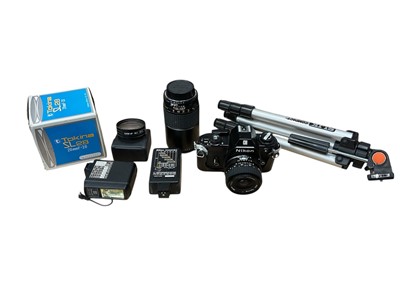 Lot 2855 - Nikon EM 35mm SLR camera with lenses and accessories