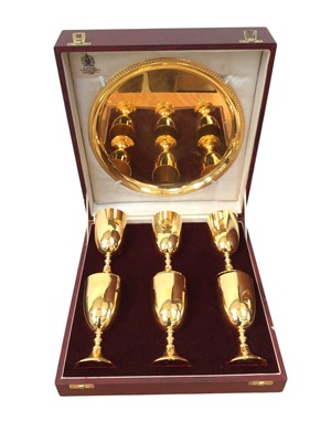 Lot 5174 - Cased set of six gold plated goblets and waiter, by repute gifted by a member of the Qatari Royal Family