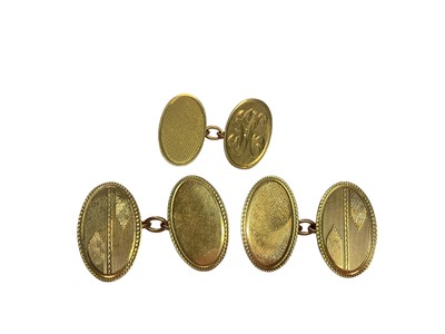 Lot 70 - Pair 9ct gold oval panel cufflinks and one other single 9ct gold cufflink (3)
