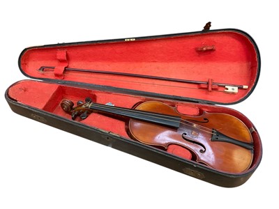 Lot 2732 - Late 19th / early 20th century Continental violin, bearing label for Stradivarius, cased with bow