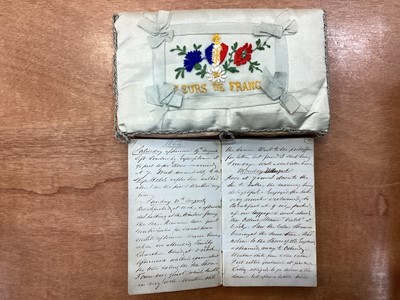 Lot 1148 - Group of ephemera, including a diary of a journey to Switzerland dated 1854, an album of pressed flowers and postcards of Jerusalem dated 1917, etc
