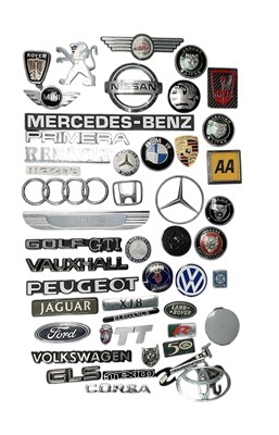 Lot 77 - Group of modern car badges for various manufacturers to include Jaguar, Porsche and BMW, (1 box).