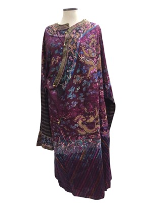Lot 2541 - 19th century Chinese embroidered purple and brown silk robe with Horse Hoof cuffs, five dragons on neck band and eight dragons on robe.