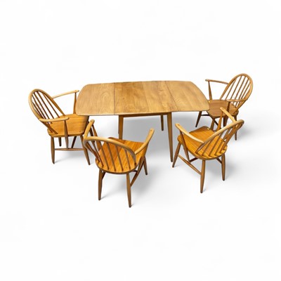 Lot 5340 - Ercol elm table and four chairs