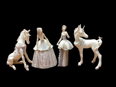 Lot 2239 - Two Lladro porcelain Unicorns together with two figures (4)