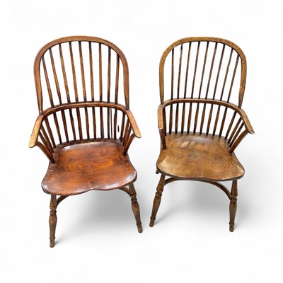 Lot 5302 - 20th century elm stick back chair and another similar, 105cm high (2)