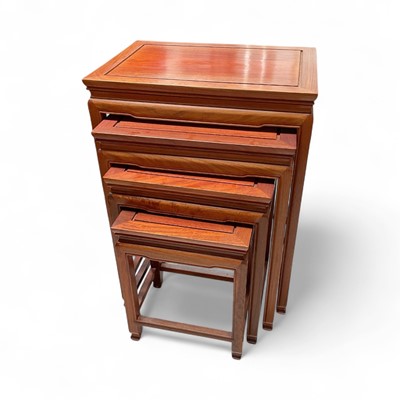Lot 5313 - Nest of four Chinese rosewood tables, the largest 66cm high
