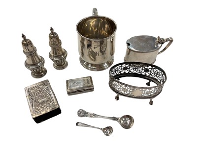 Lot 930 - 1920s silver christening mug, 1930s silver mustard with blue glass liner, Victorian silver condiment (lacking liner), pair of silver pepperettes