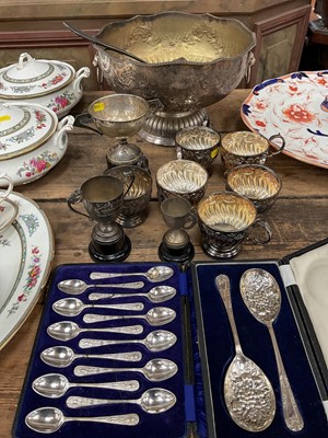 Lot 31 - Silver plated punch bowl and six cups with ladle, and two boxed sets of plated cutlery