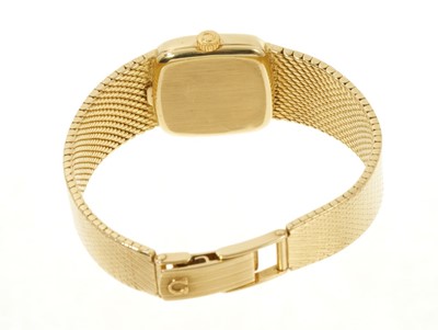 Lot 766 - Ladies' 18ct gold Omega wristwatch with an integral 18ct gold Milanese strap