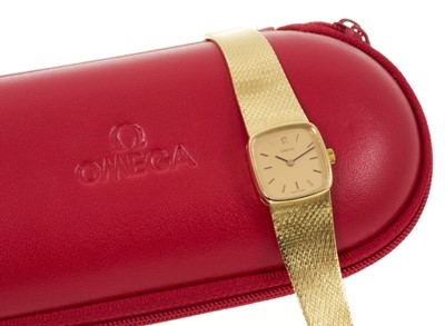 Lot 766 - Ladies' 18ct gold Omega wristwatch with an integral 18ct gold Milanese strap
