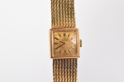 Lot 767 - Ladies' Omega 18ct gold wristwatch with an integral 18ct gold bracelet