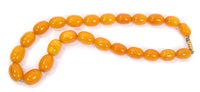 Lot 3414 - Old amber necklace with a string of graduated...