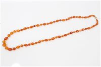 Lot 3415 - Antique amber necklace with a string of...