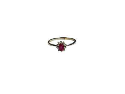 Lot 50 - Ruby and diamond cluster ring on 18ct white gold shank