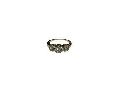 Lot 52 - Diamond cluster ring with a triple daisy cluster of brilliant cut diamonds, in 9ct white gold setting