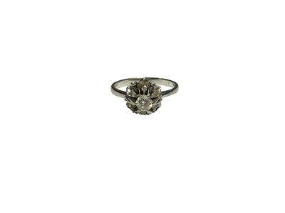 Lot 58 - Diamond cluster ring with a flower shaped cluster of brilliant cut diamonds in white gold setting (stamped 750)