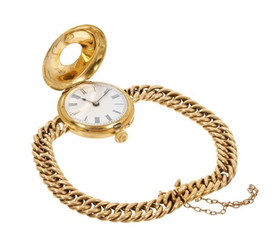 Lot 787 - Ladies' gold half hunter wristwatch on curb link chain