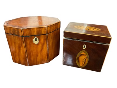 Lot 241 - George III satinwood octagonal tea caddy, together with another mahogany example wth inlaid shell and flower head panels (2)