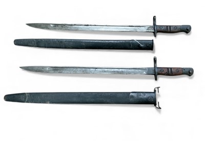 Lot 857 - Two First World War American Remington bayonets with scabbards