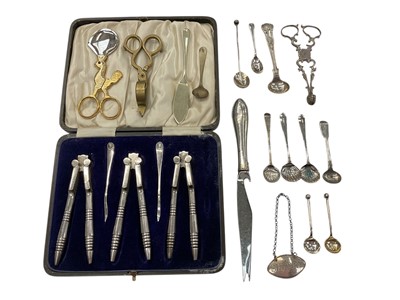 Lot 968 - Pair of Georgian silver sugar tongs, Georgian silver Sherry label, group of Georgian silver condiment spoons, other plated flatware