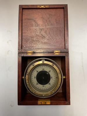 Lot 2929 - Ship's gimbal compass in fitted mahogany case with key, with patent number and other marks to the rim, the case measuring 21.5cm wide