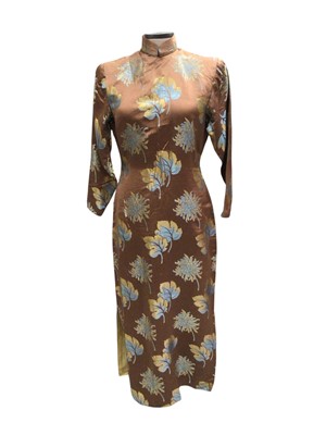 Lot 2501 - Five Pre-1945 silk Cheongsam dresses, including gold and bats, green with leaves etc. Hand sewn. All one lady's collection.