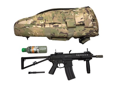 Lot 5095 - Double Bell black metal air soft gun with pellets, magazine and a camouflage case
