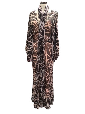 Lot 2506 - Three 1930s evening dresses including peach and black geometric dress with slip and scarf, 1930s bias cut black satin dress with beaded neckline and bias cut floral dress.