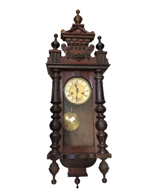 Lot 5170 - Stained pine hanging wall clock, approximately 95cm long