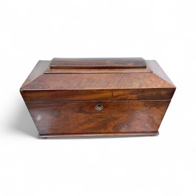 Lot 5167 - Large 19th century sarcophagus form mahogany tea caddy with two interior canisters and central cut glass mixing bowl, key present, 40cm wide including handles