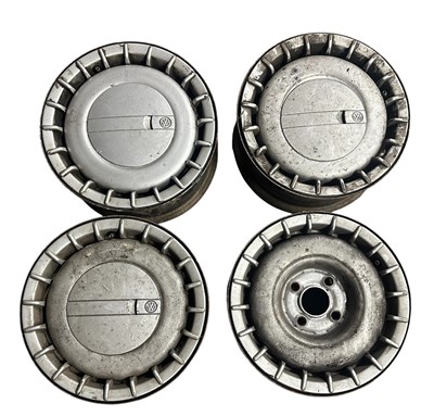 Lot 149 - Set of four Volkswagen steel wheels and wheel trim to suit MK2 Golf and Jetta models, (4).