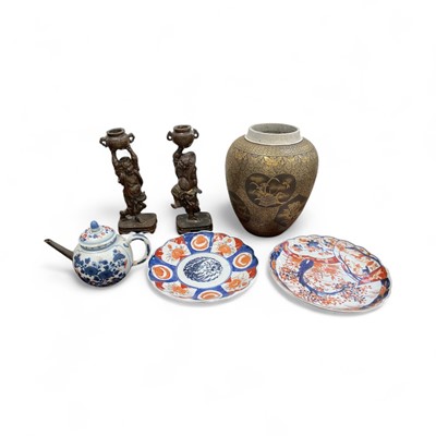 Lot 5243 - Pair of Japanese mixed metal figural candlesticks, with seal marks to bases, together with a Japanese gilt and black Satsuma vase, a pair of Imari plates, and an 18th century Chinese Imari teapo...
