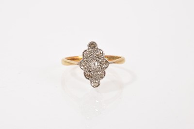 Lot 635 - Diamond cluster ring with a marquise shape cluster on nine old cut diamonds in platinum setting on 18ct gold shank