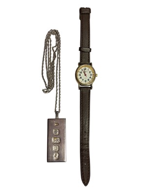 Lot 27 - Silver ingot pendant on chain and a ladies Quartex wristwatch