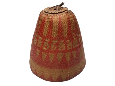 Lot 2525 - Hand woven natural fibre cap in geometric design and conical shape, probably a women's hat.