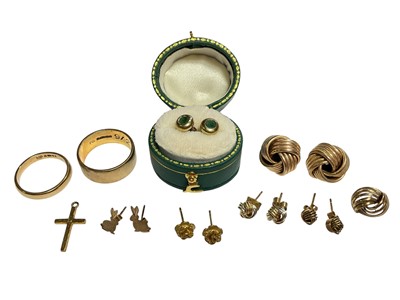 Lot 32 - Two 9ct gold wedding rings, 9ct gold cross pendant and various 9ct gold earrings