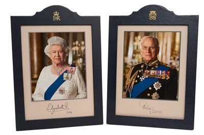 Lot 28 - H.M. Queen Elizabeth II and H.R.H. The Duke of Edinburgh, fine large pair 2014 signed presentation portrait photographs