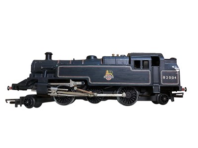 Lot 1755 - Tri-ang OO Gauge BR black early emblem 2-6-2 Class 3MT tank engine 82004, Hornby BR lined black early emblem 0-4-4 Class M7tank engine 30027, LMS maroon 4-6-0 tender locomotive 4657 and Triang 4-...