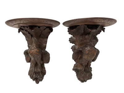 Lot 1207 - Pair of 19th century Black Forest carved wall brackets