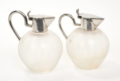 Lot 354 - Pair of early 20th century Christopher Dresser design whiskey noggins