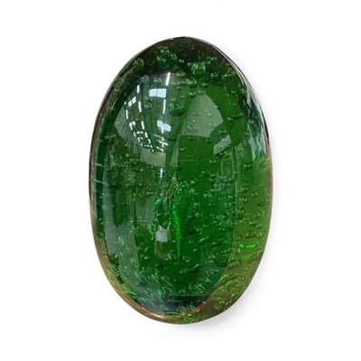 Lot 103 - Large Victorian emerald green glass ‘Dumpy’ weight, of unusually large proportions, decorated with air bubbles. Rough pontil mark to base. 19cm high