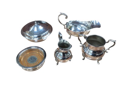 Lot 5013 - Silver bottle coaster with 1977 crown, and a group of silver plate