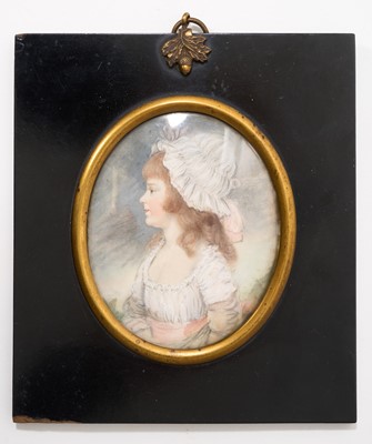 Lot 975 - Attributed to John Russell RA (1745-1806), 18th century pastel on paper portrait miniature of a young girl, wearing her hair in a bonnet with pink bows and matching dress. In original eb...